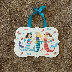 Mermaid wall sign